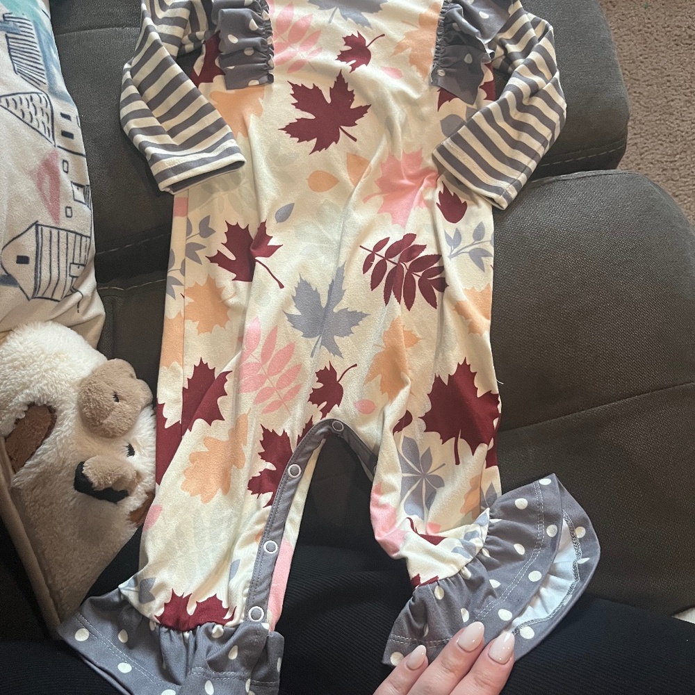B 16      Little Millie Ivory and Orange Fall Ruffle/ Striped Long Sleeve Romper